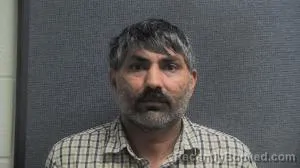 Mugshot of Kashik Baldevbhai Suthar booked in Boone County, Kentucky on September 18, 2026