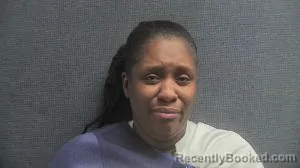 Mugshot of Asia C Mccoy booked in Boone County, Kentucky on September 21, 2026