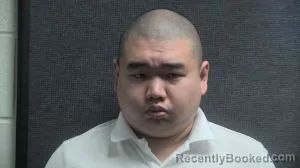 Mugshot of Alan Johnathan Zhang booked in Boone County, Kentucky on September 29, 2026