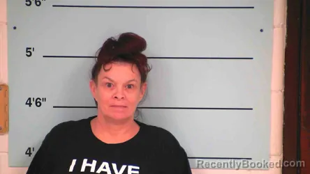 Mugshot of Angela Marie Desloge-Carroll booked in Bourbon County, Kentucky on August 7, 2026