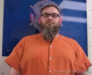 Mugshot of TRAVIS HYLTON