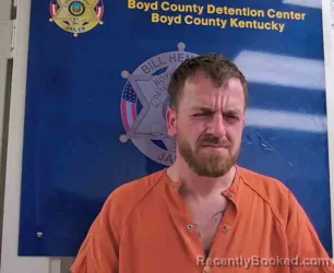 Mugshot of JUSTIN WOLFE