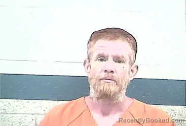 Mugshot of JOSHUA RAY MINK booked in Breckinridge County, Kentucky on May 14, 2026