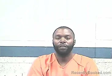 Mugshot of MBAJIMBERE NGIRABAKUNZI booked in Breckinridge County, Kentucky on April 24, 2026