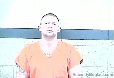 Mugshot of TRAVIS AMBROSE METTLING