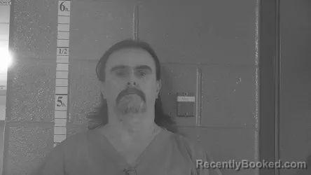 Mugshot of JOHNNY DARREN COATES booked in Bullitt County, Kentucky on July 15, 2026