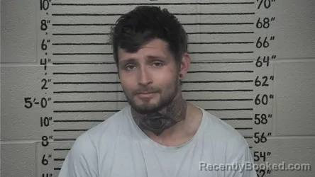 Mugshot of ZACHARY L KINDER booked in Carter County, Kentucky on April 2, 2026