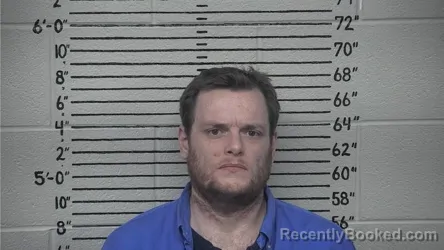 Mugshot of JOHN M DYER booked in Carter County, Kentucky on April 6, 2026