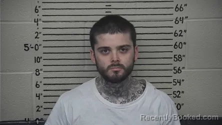 Mugshot of IAN JUSTICE booked in Carter County, Kentucky on April 16, 2026