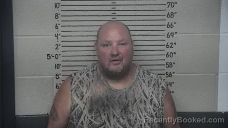 Mugshot of John E Jones booked in Carter County, Kentucky on September 13, 2026