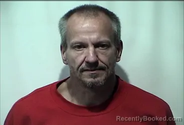 Mugshot of JOHN JATTATS HUGHES