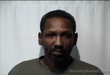 Mugshot of DEREK LAMAR SETTLES booked in Christian County, Kentucky on March 13, 2026