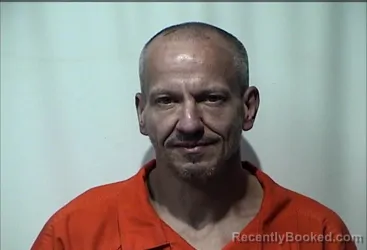 Mugshot of JOHN JATTATS HUGHES booked in Christian County, Kentucky on March 18, 2026