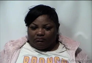 Mugshot of NATERIKA ROYNA CARTER booked in Christian County, Kentucky on March 25, 2026