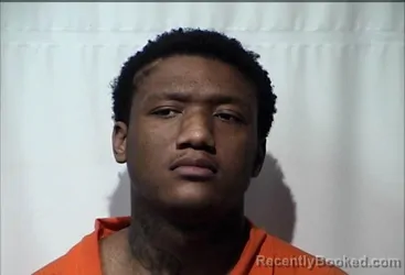 Mugshot of LETREVION DEMAR WASHINGTON booked in Christian County, Kentucky on March 26, 2026