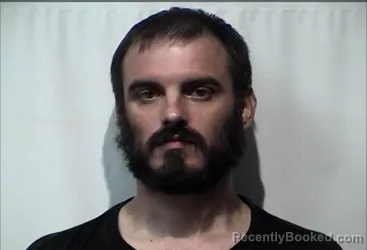 Mugshot of LOGAN TODD MANN booked in Christian County, Kentucky on April 25, 2026