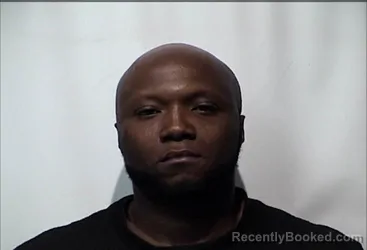 Mugshot of DEVAN DEWON CARNEAL booked in Christian County, Kentucky on April 26, 2026