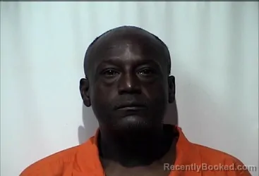 Mugshot of RICHARD DEXTER COLEMAN booked in Christian County, Kentucky on May 13, 2026