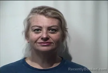 Mugshot of REBECCA MAY WEAVER booked in Christian County, Kentucky on June 14, 2026