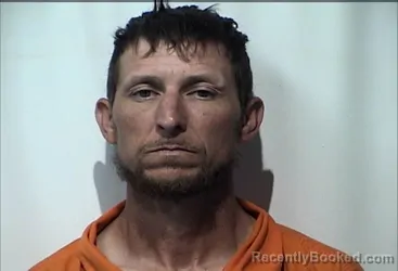 Mugshot of Jason Edward Cooper booked in Christian County, Kentucky on August 4, 2026