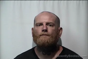 Mugshot of Justin Wade Miller booked in Christian County, Kentucky on October 6, 2026
