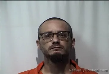 Mugshot of Dustin Lynn Rosario booked in Christian County, Kentucky on October 8, 2026