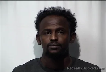 Mugshot of Hamza Ali Mohamed booked in Christian County, Kentucky on October 13, 2026