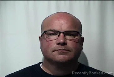 Mugshot of Mark Cameron Rackers booked in Christian County, Kentucky on October 17, 2026