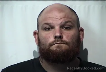 Mugshot of Aaron Michael Pilarski booked in Christian County, Kentucky on October 21, 2026