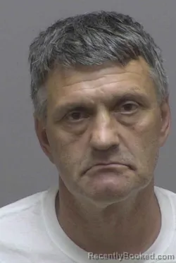 Mugshot of ANDREY VASIL TROTSENKO booked in Lincoln County, North Carolina on April 1, 2026