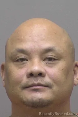 Mugshot of YIA VANG booked in Lincoln County, North Carolina on March 30, 2026