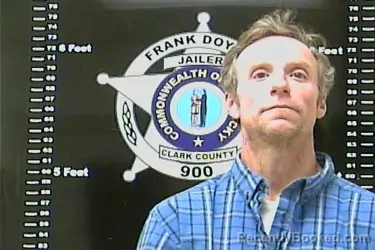 Mugshot of TRAVIS M EVANS