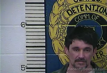 Mugshot of REN R MIHUTA