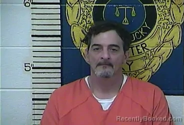 Mugshot of TROY REVIS