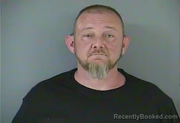 Mugshot of Christopher Burrus booked in Crittenden County, Kentucky on March 19, 2026