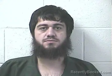 Mugshot of AINDI ABDUEV