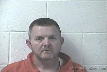 Mugshot of Brandon Delan Harlan booked in Daviess County, Kentucky on October 11, 2026