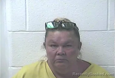 Mugshot of CYNTHIA DIANNE RHOADS booked in Daviess County, Kentucky on April 15, 2026