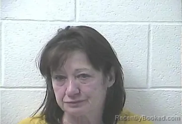 Mugshot of Deborah Lynn Curry booked in Daviess County, Kentucky on October 16, 2026