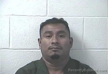 Mugshot of Rolando Espinobarros Cano booked in Daviess County, Kentucky on October 21, 2026