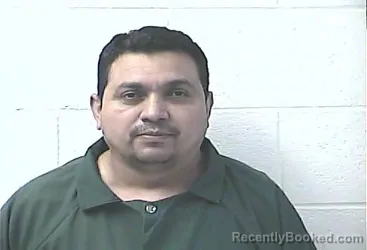 Mugshot of ROMMEL IVAN GARCIA-BUSTILLO booked in Daviess County, Kentucky on April 15, 2026