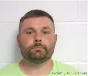 Mugshot of MICHAEL EUGENE SCHIEMAN booked in Macon County, North Carolina on April 10, 2026