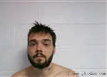 Mugshot of DALLAS GILES DISHMAN booked in Macon County, North Carolina on May 6, 2026