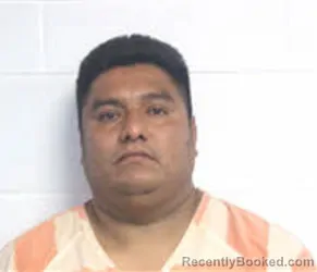 Mugshot of IVAN HUERTA ESPINOZA booked in Macon County, North Carolina on April 22, 2026