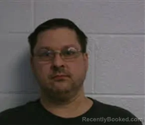 Mugshot of DERRICK MICHAEL LENART booked in Macon County, North Carolina on March 27, 2026