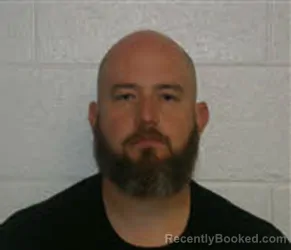 Mugshot of JAMES KYLE KINSLAND booked in Macon County, North Carolina on July 6, 2026