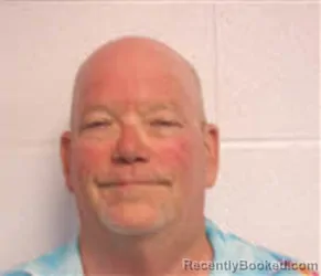 Mugshot of Alan Corkran Dzielak booked in Macon County, North Carolina on August 8, 2026