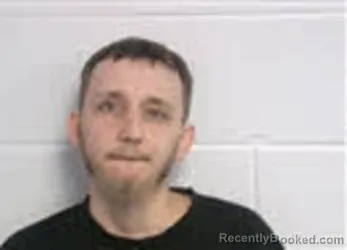 Mugshot of Tyler Ryan Rostallon booked in Macon County, North Carolina on September 28, 2026
