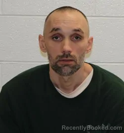 Mugshot of JUSTIN GELNN COOMER