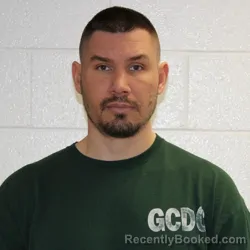 Mugshot of MARCUS JOHN BUCKHANAN